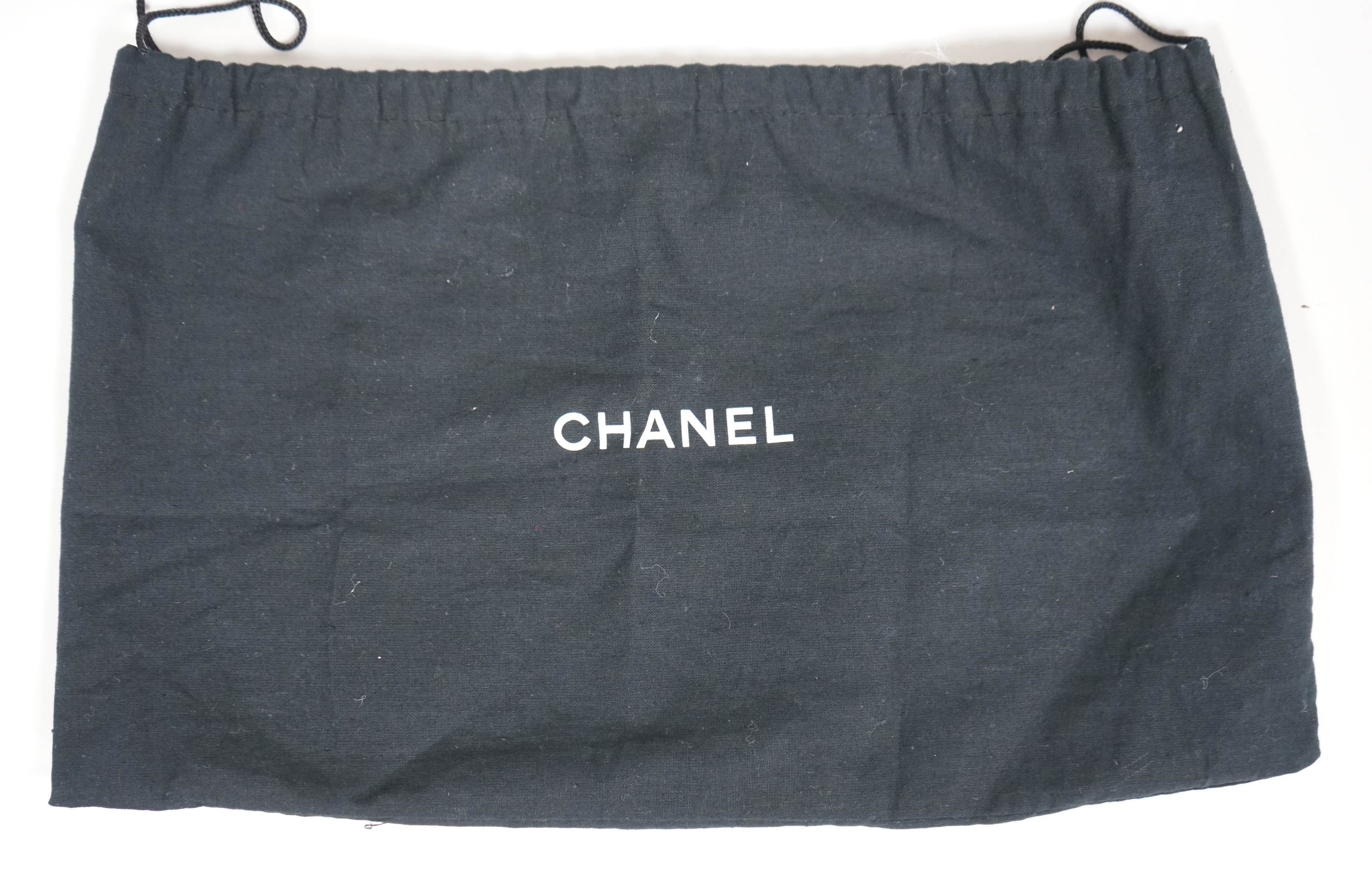 A Chanel No 5 Madamoiselle tri colour canvas and leather, chain shoulder handbag, with dust bag, width 29cm, height 16cm, overall height 35cm, depth 9cm, Please note this lot attracts an additional import tax of 20% on t